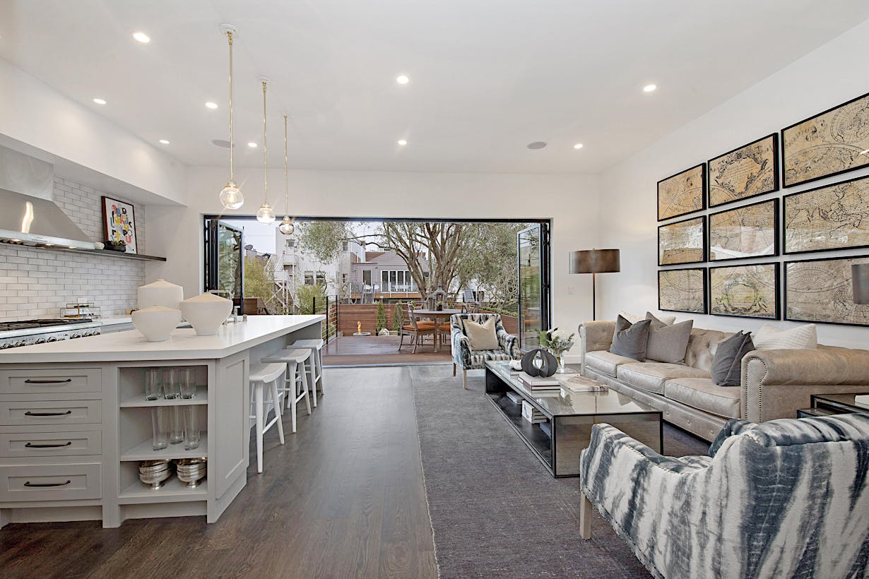 open concept living in san francisco with folding glass wall