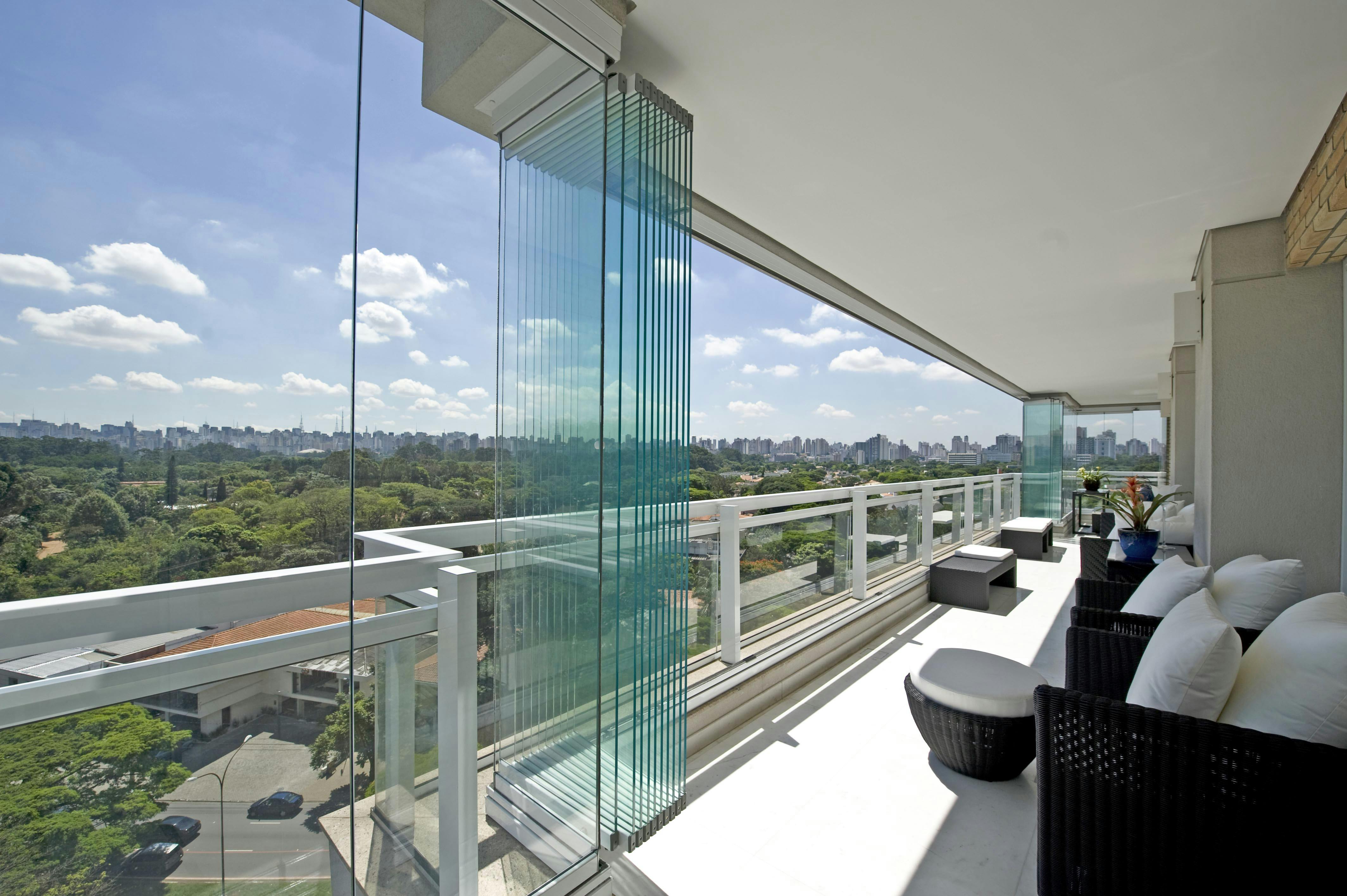 Balcony enclosed with an all glass operable system.