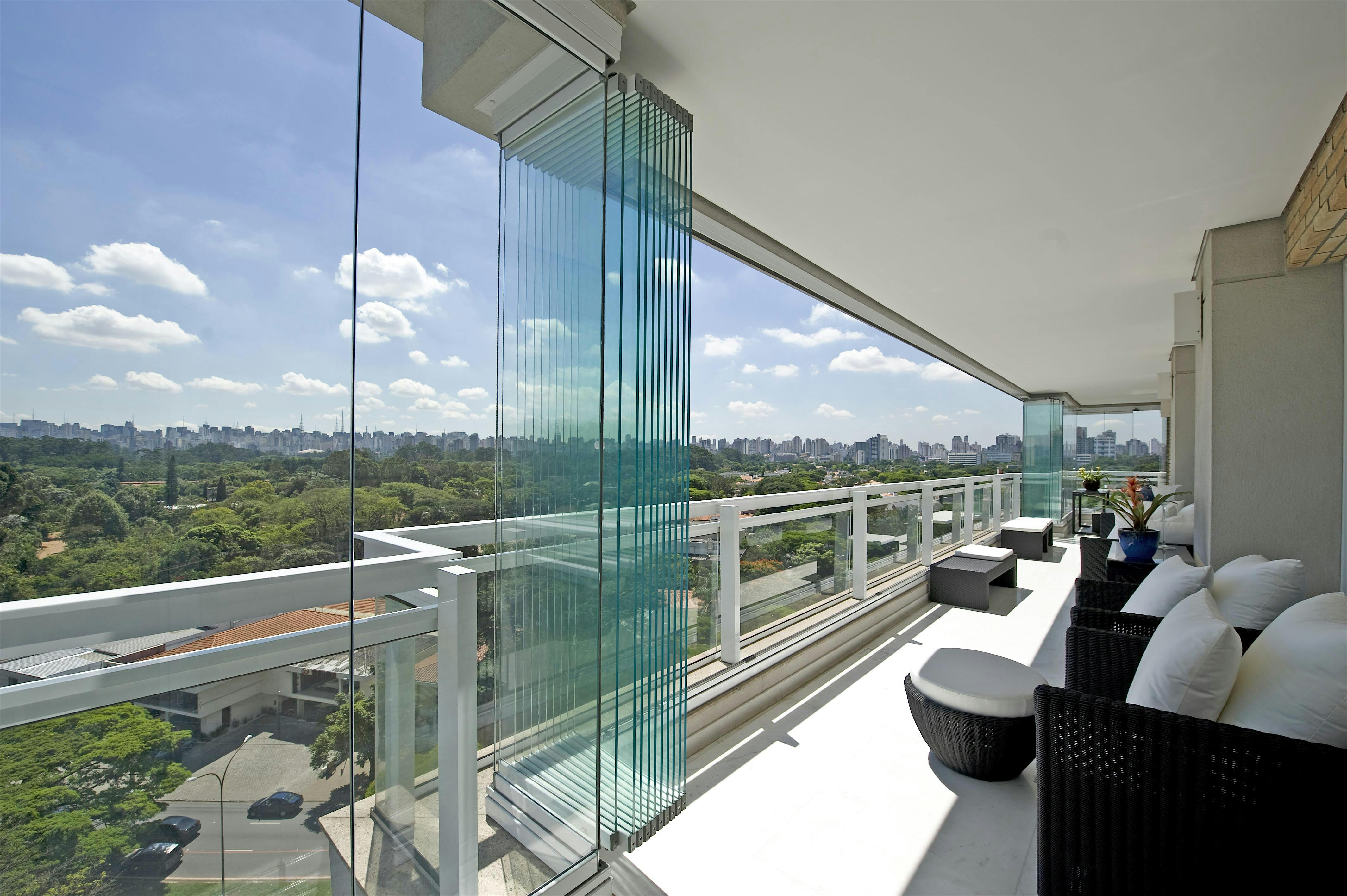 Balcony enclosed with an all glass operable system.
