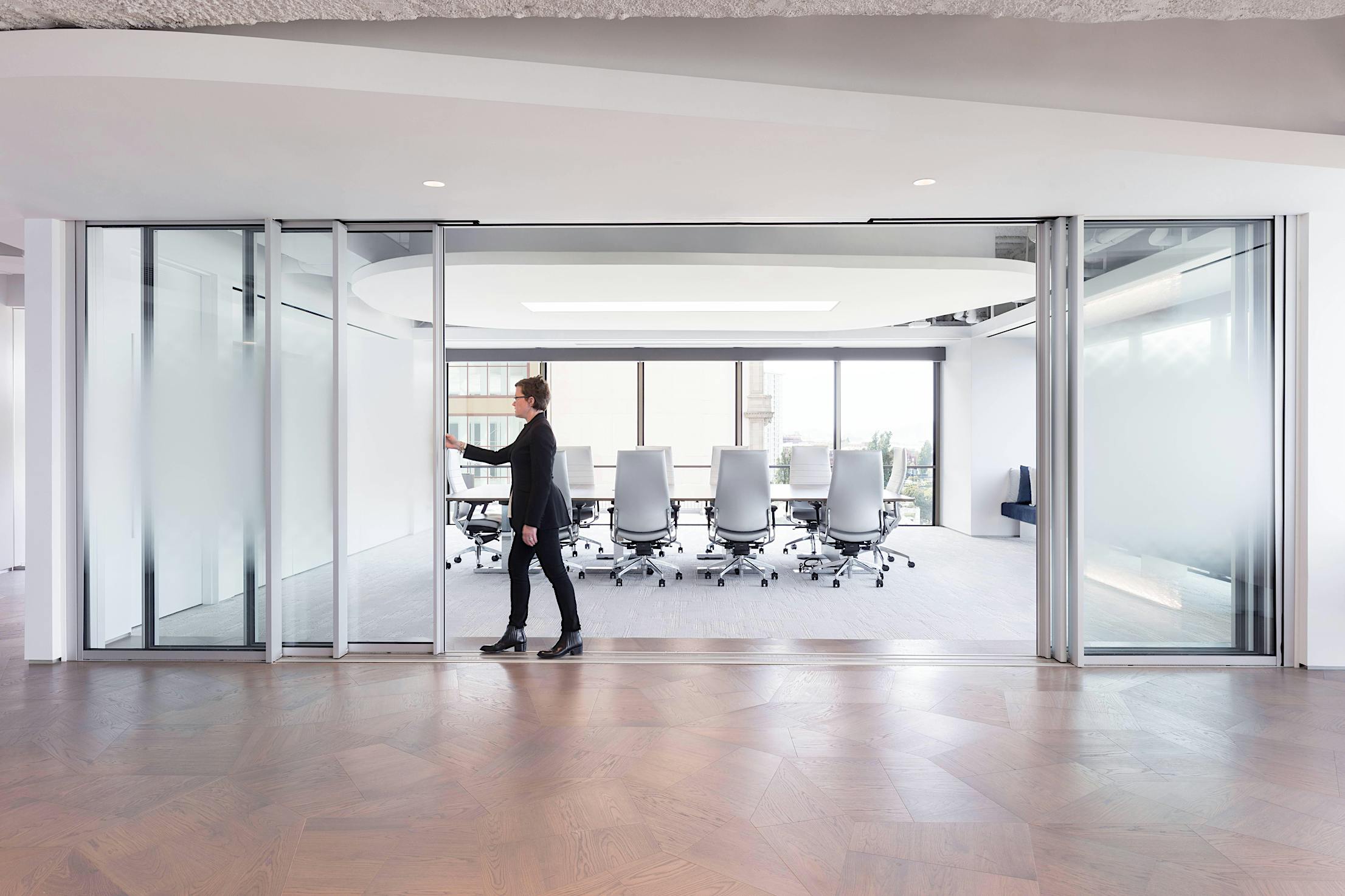 minimal sliding glass wall with beautiful aesthetics in an office