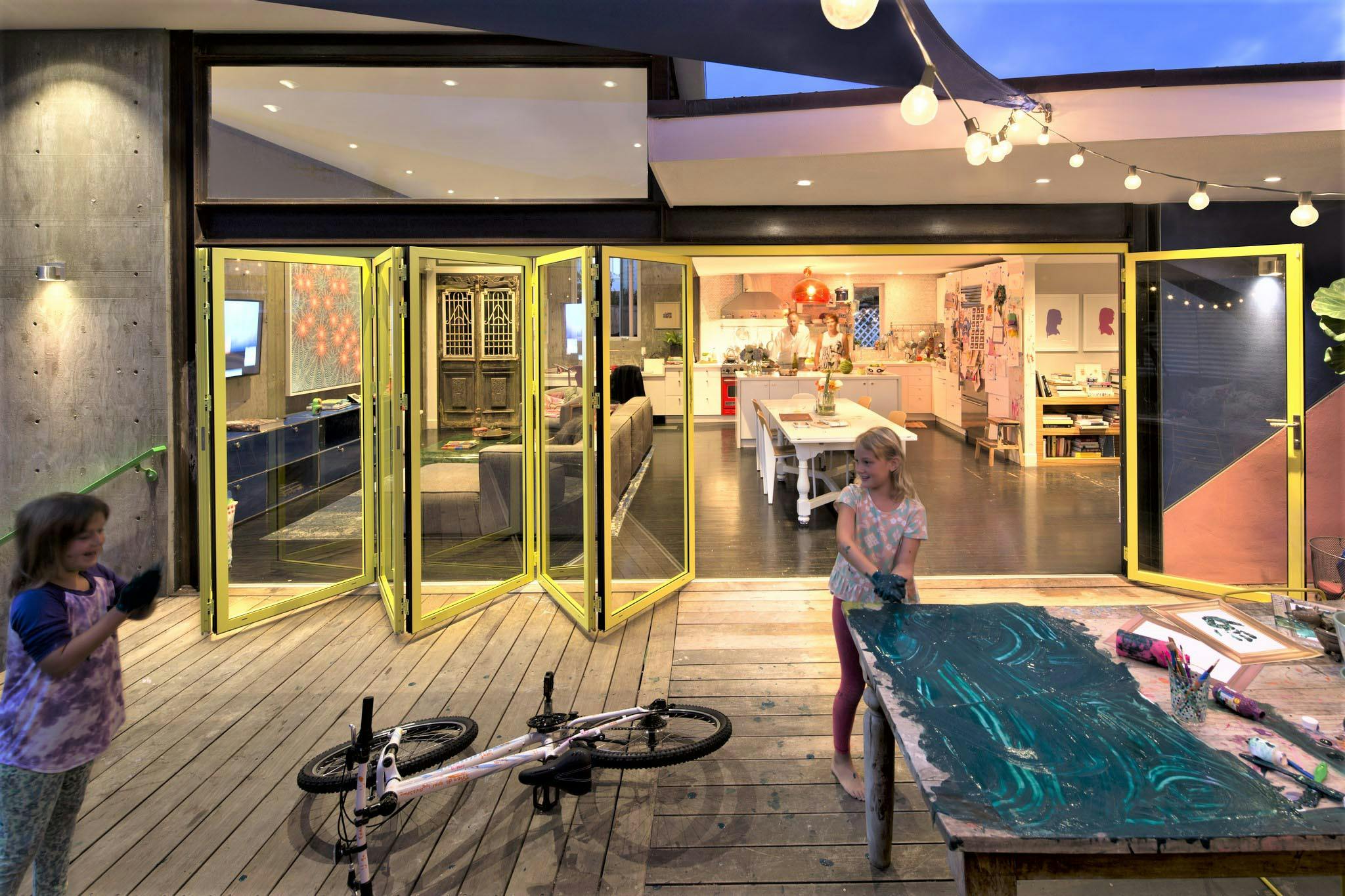 children playing in front of traditional patio door replacement