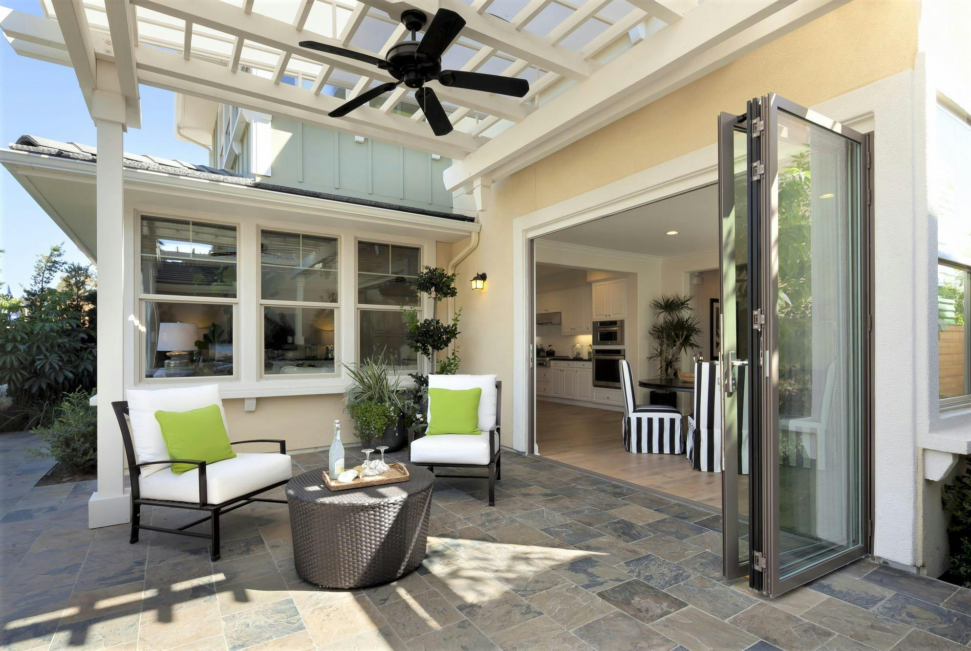 Folding glass patio deals doors