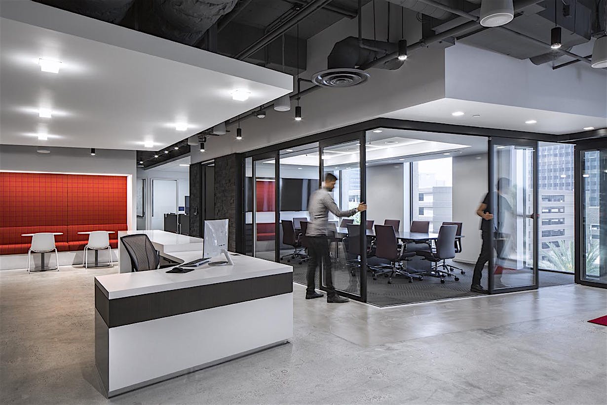 NanaWall HSW System single track sliding glass wall in interior office