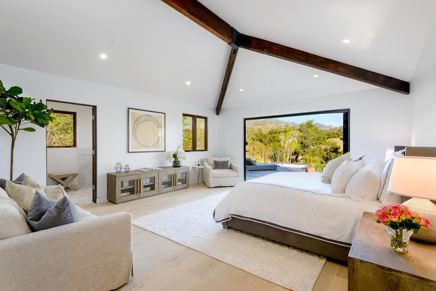 serene retreat in master bedroom in contemporary ranch remodel with NanaWall FoldFlat system