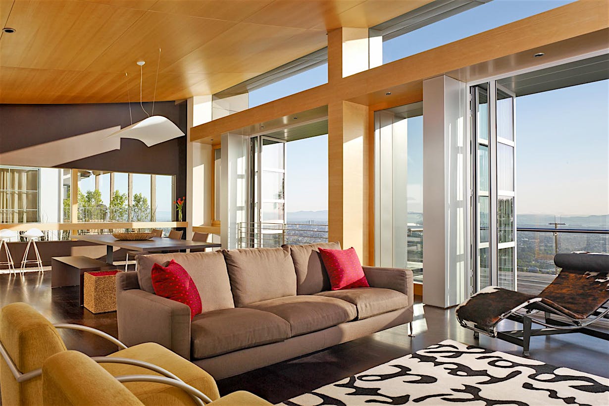 hillside modern home design inspiration with view through folding glass door