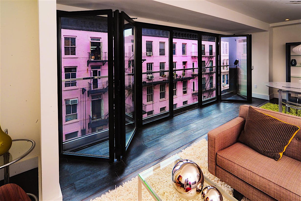 new york city midrise multifamily homes with balconies for property differentiation