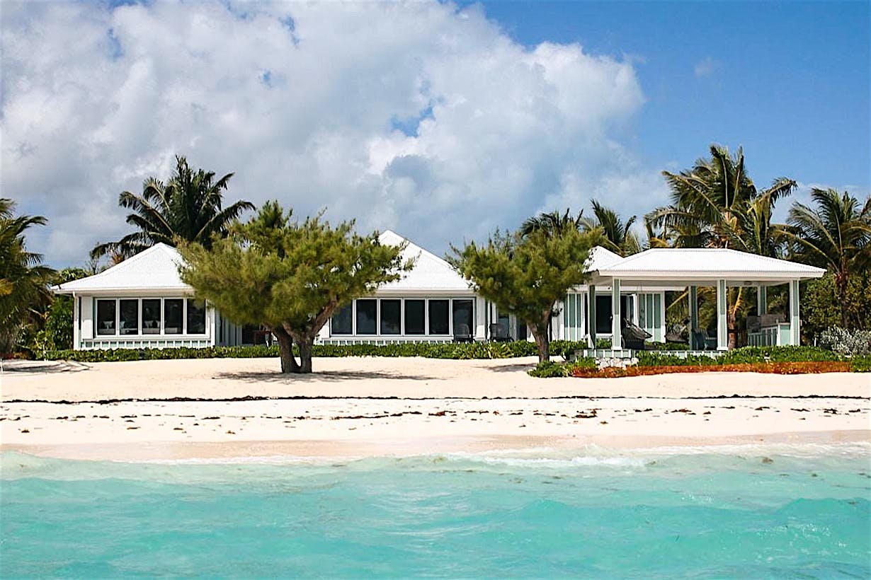vacation home with folding glass windows with windload resistance for hurricane season