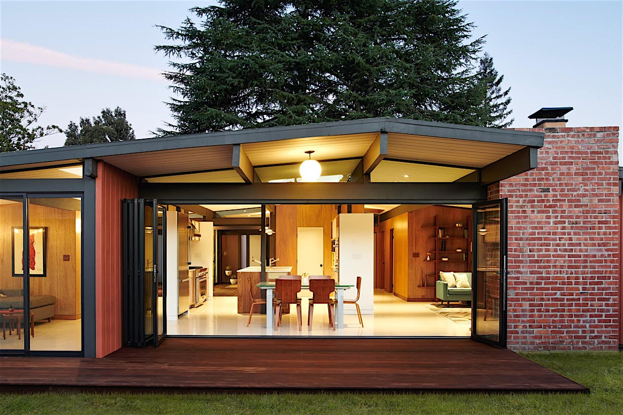 Eichler homes remodel with folding glass wall to let the outdoors in