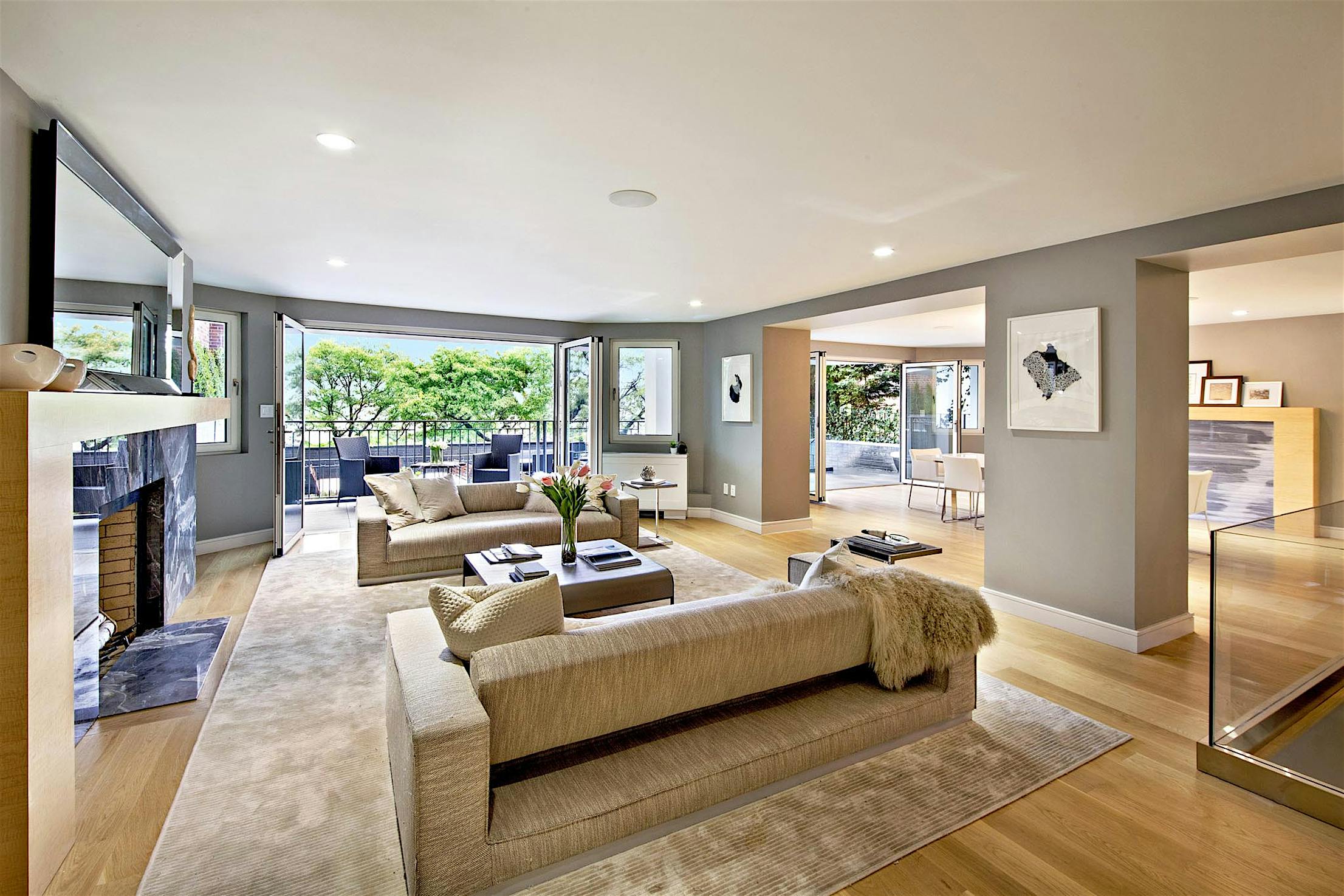 new york city highend townhome with indoor/outdoor living and folding glass walls