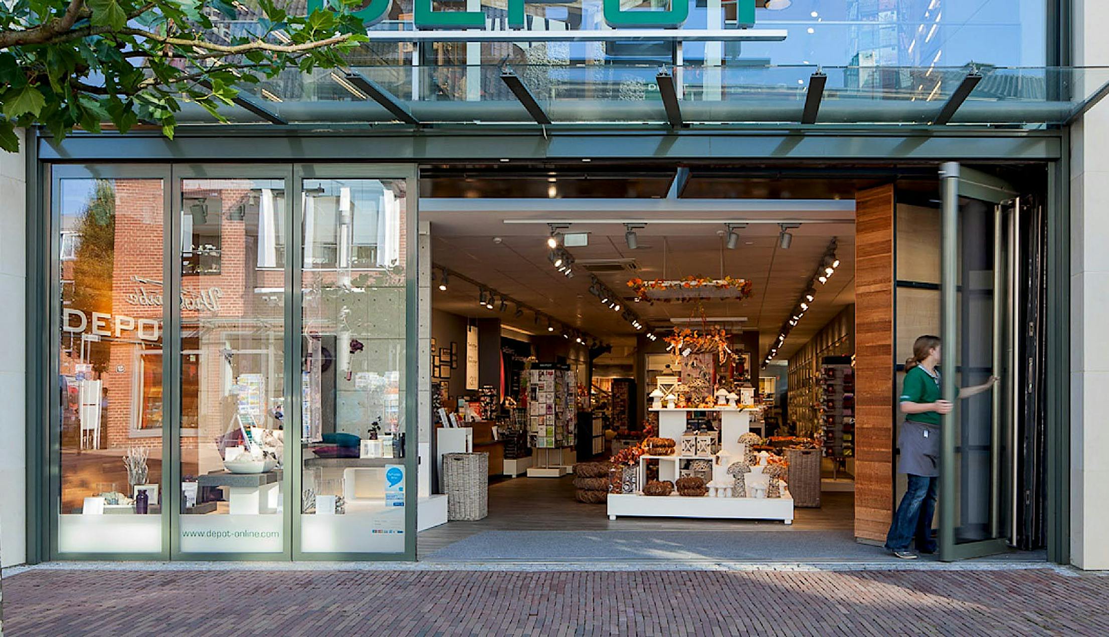 commercial design retail storefronts with moveable glass wall being opened