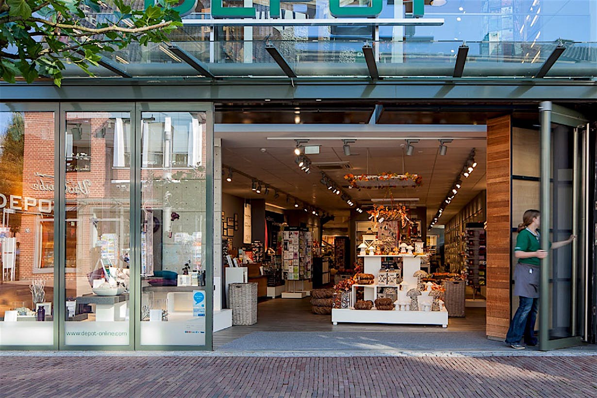 commercial design retail storefronts with moveable glass wall being opened