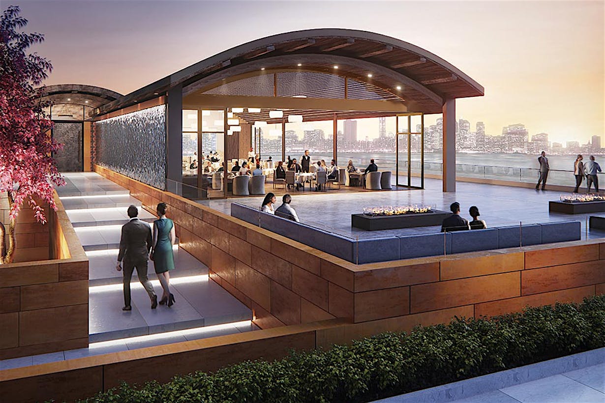 moveable glass walls in waterfront restaurant open to the patio and view