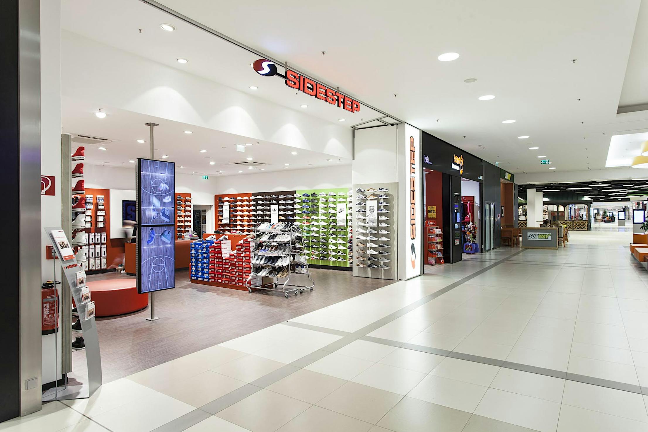 commercial design with disappearing retail storefront in a mall