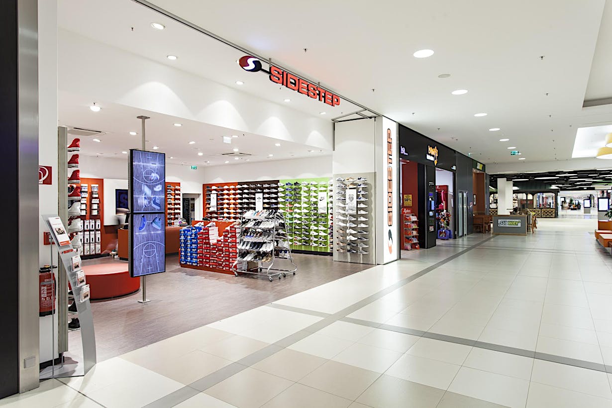 commercial design with disappearing retail storefront in a mall