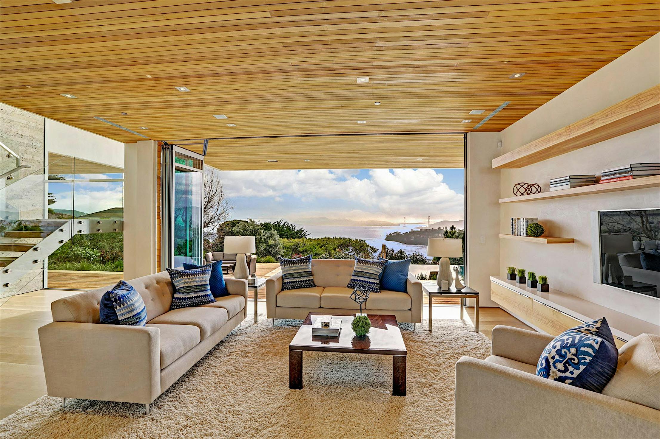 living room design inspiration with opening glass walls highlight view of golden gate bridge