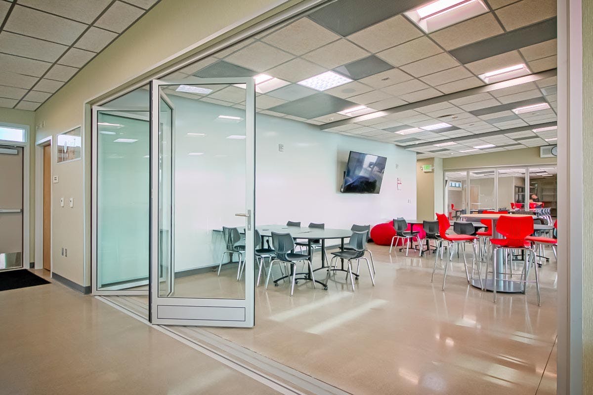 21st Century learning environment with folding glass bifold door for flexible curriculums