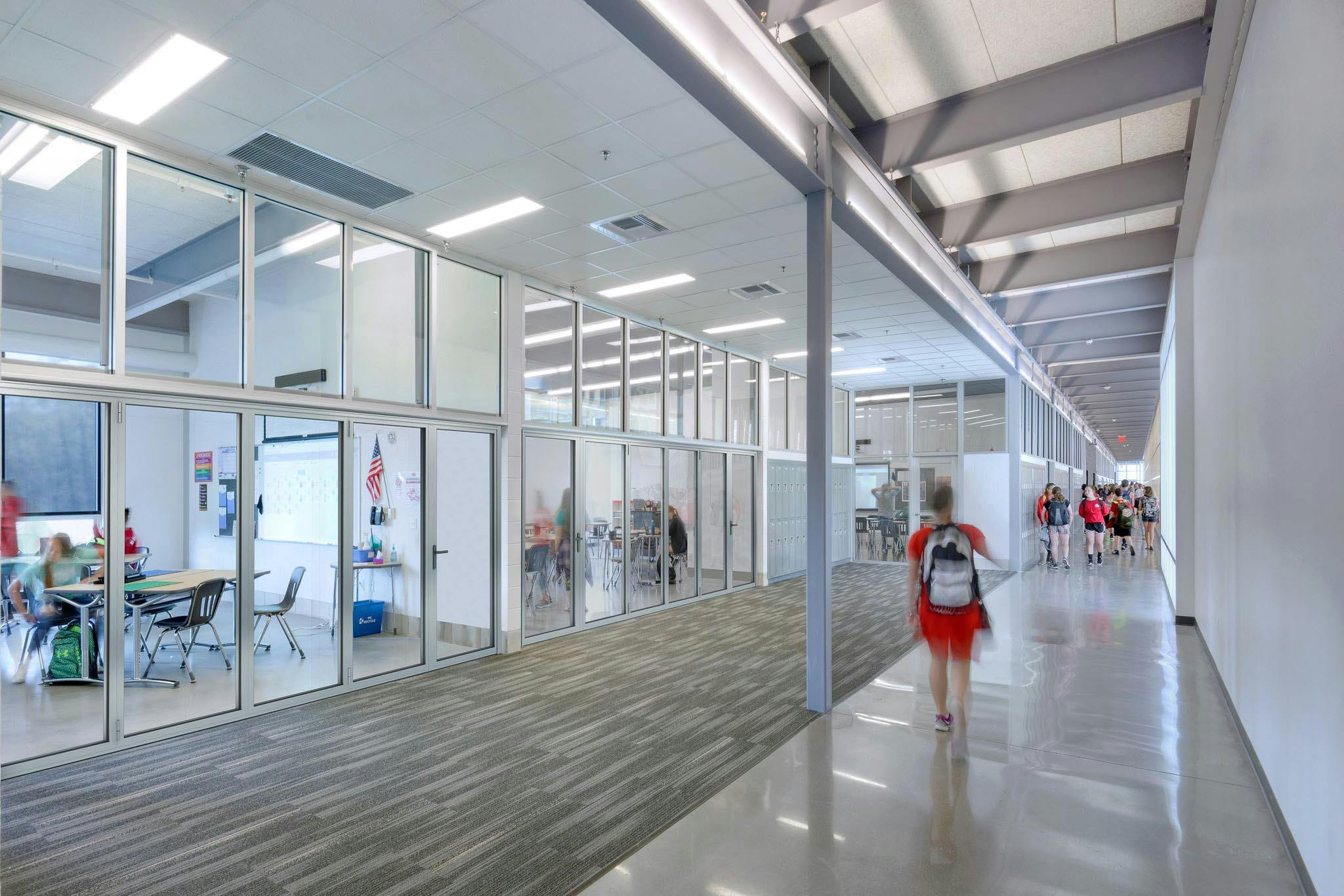 sound-rated opening glass walls in 21st Century classroom design for acoustical buffering to hallway