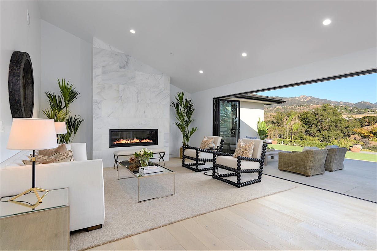 California ranchstyle home remodeled with folding glass walls in living room