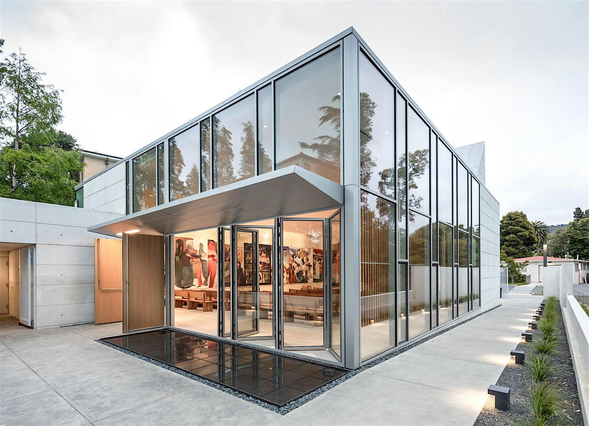 saint mary's new chapel design with opening glass walls