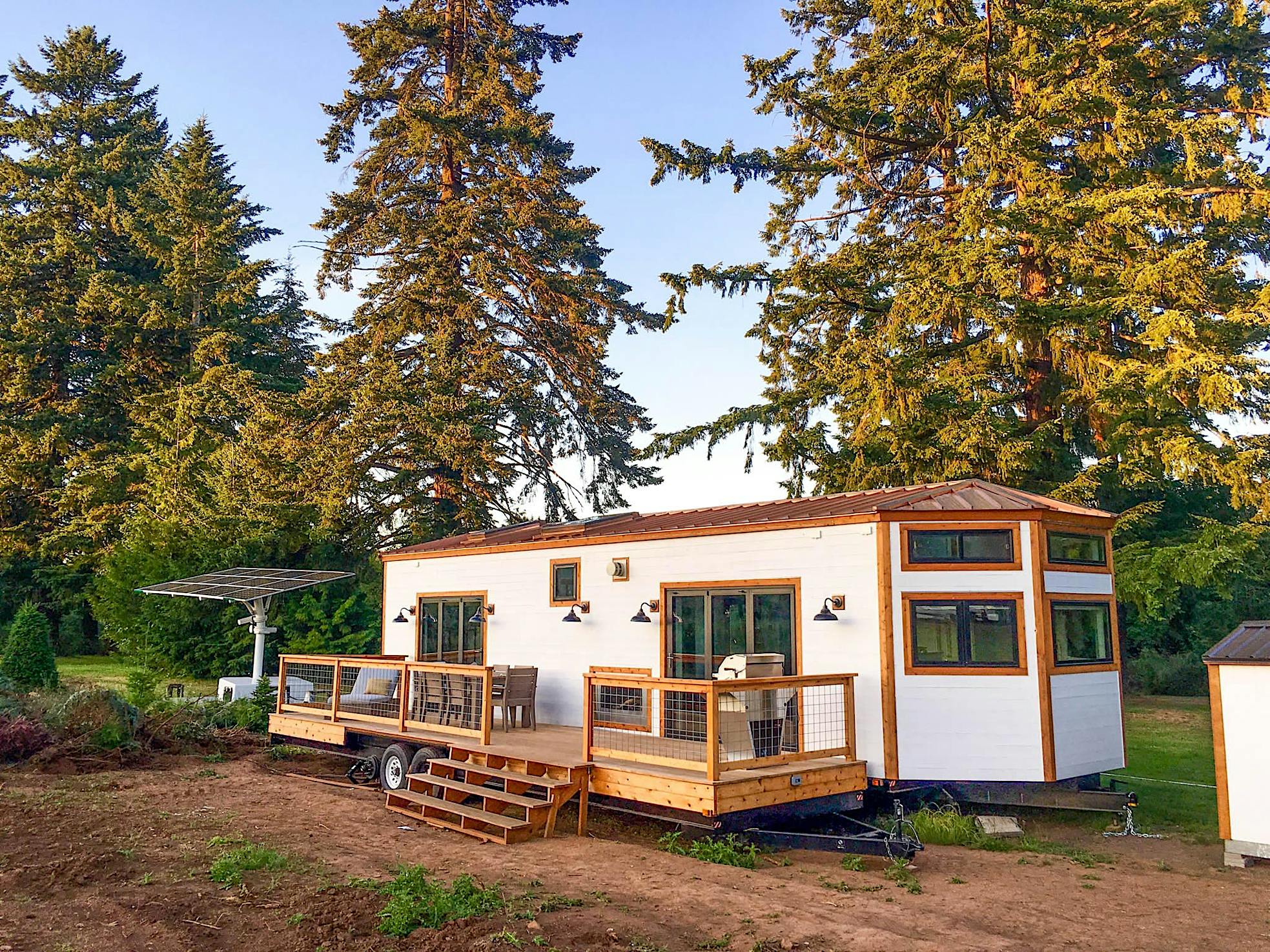 tiny home in Hawaii with two folding glass walls that open to deck