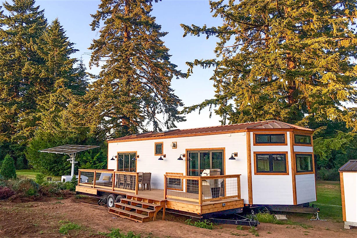 tiny home in Hawaii with two folding glass walls that open to deck