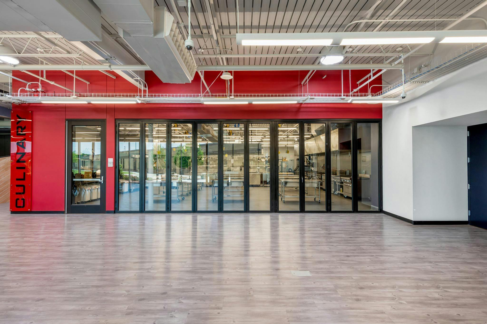 Lubbock culinary career center with closed folding glass walls