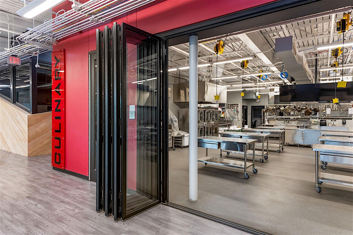 close up of folding glass doors in high school career center for culinary arts