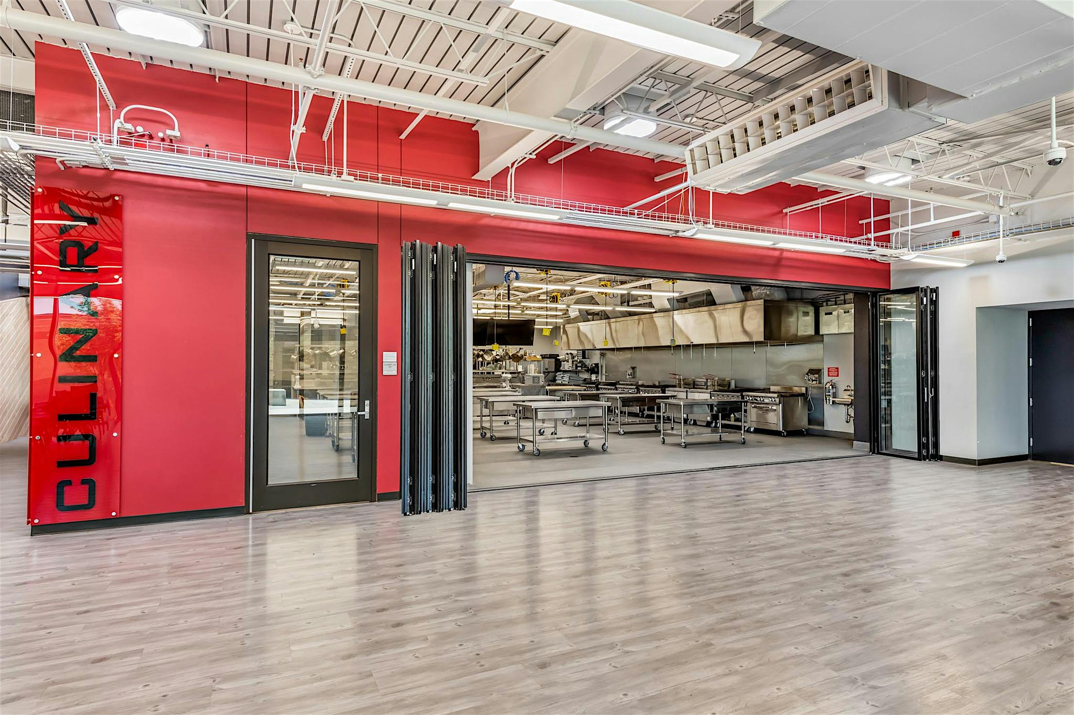 career and technical education center for high school students to learn with folding glass walls