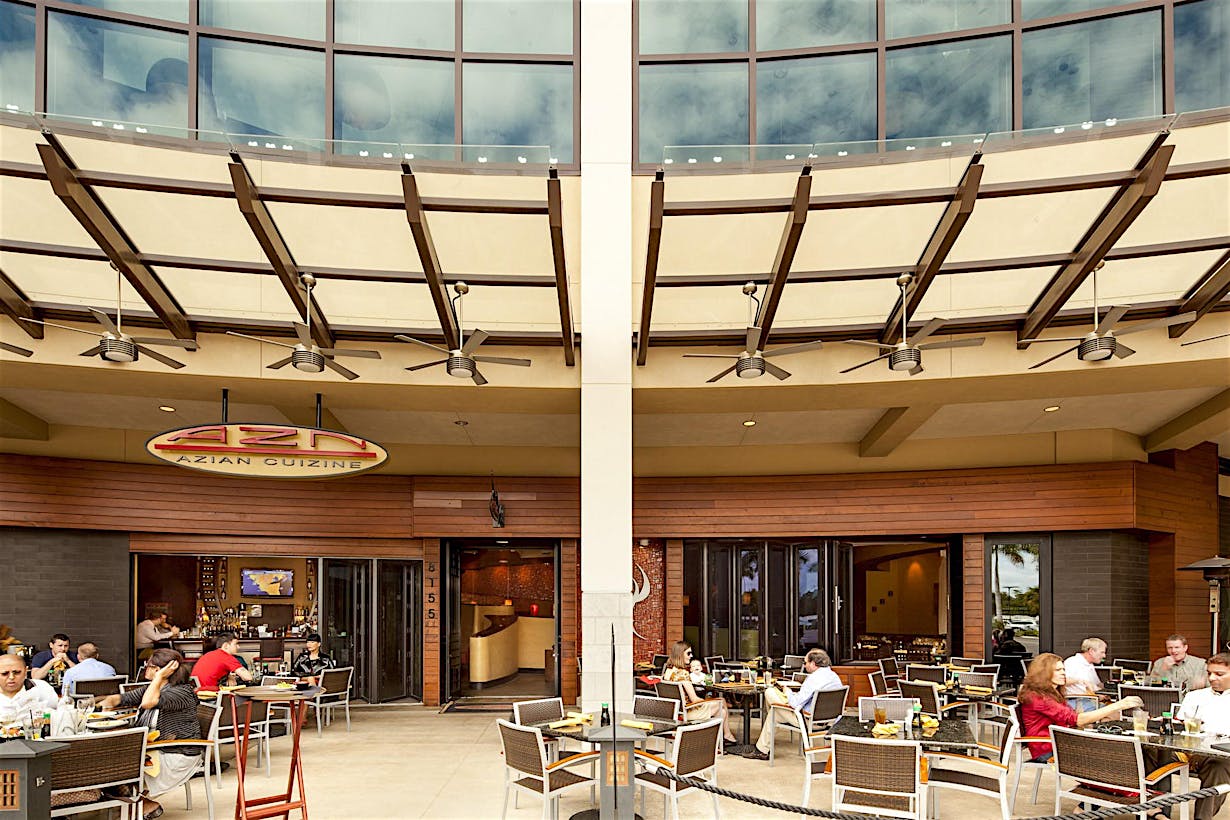 open restaurant design facilitates outdoor dining with moving glass walls