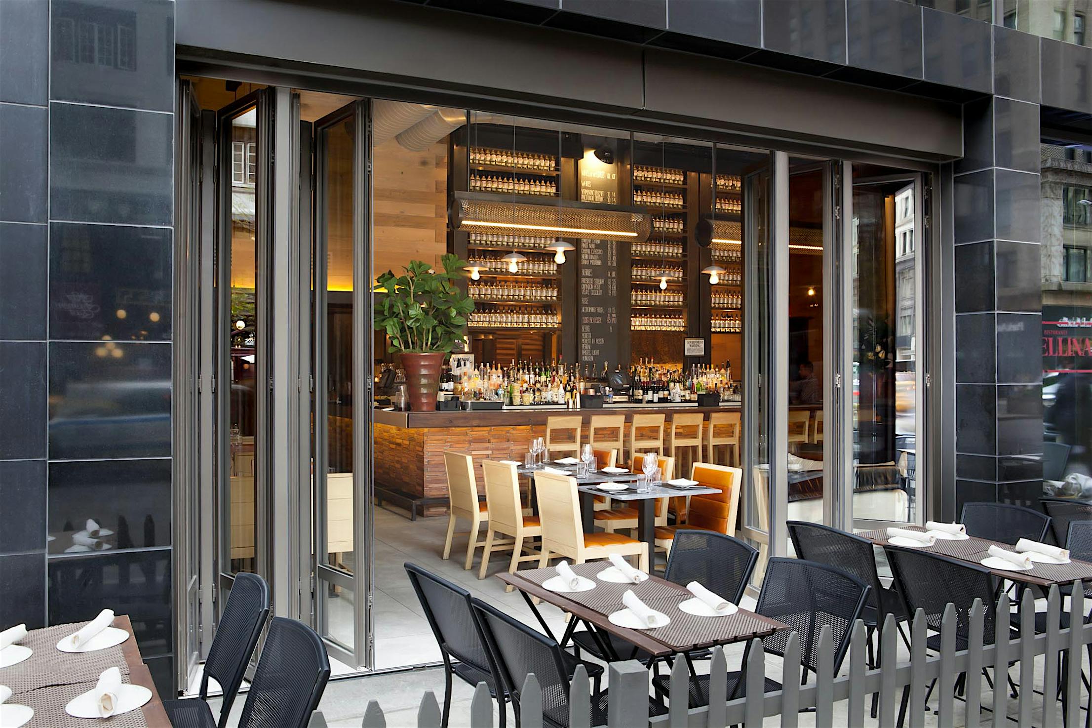open restaurant design with folding glass walls