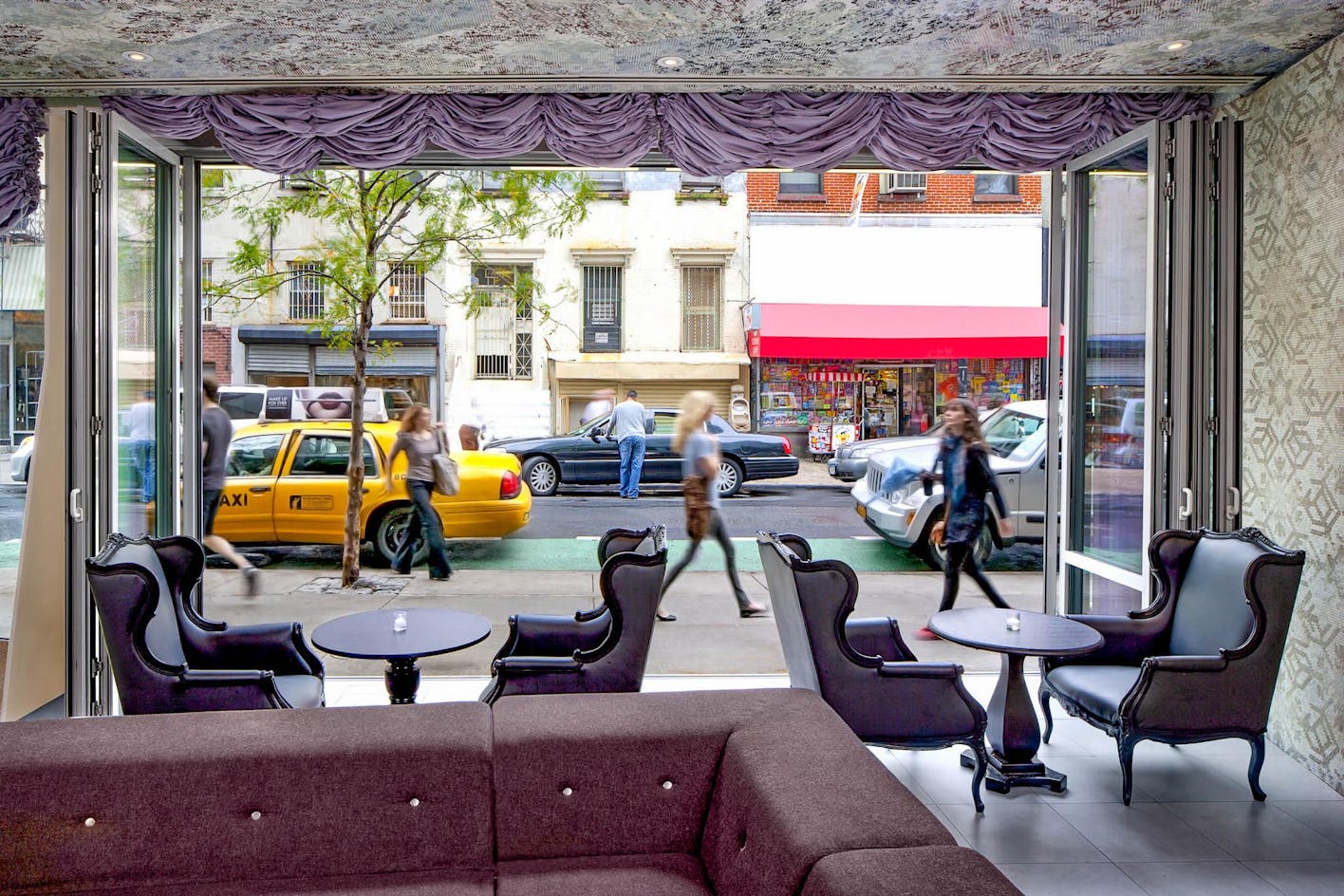 commercial moving glass walls open restaurant to street for fresh air