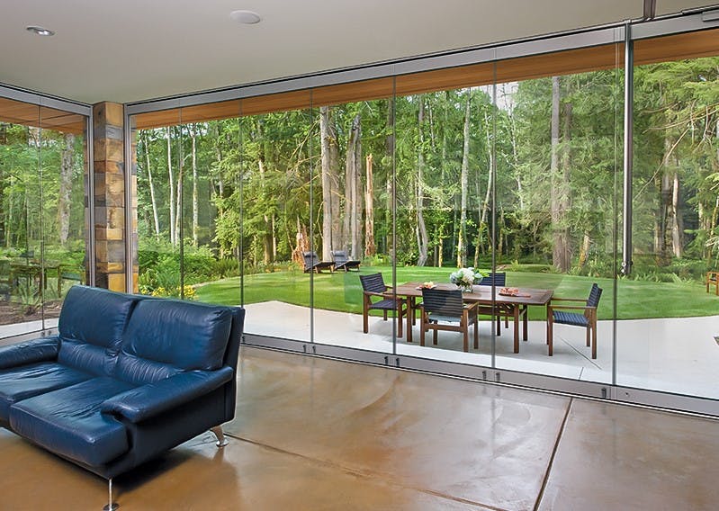 sunroom with frameless exterior glass walls ClimaClear