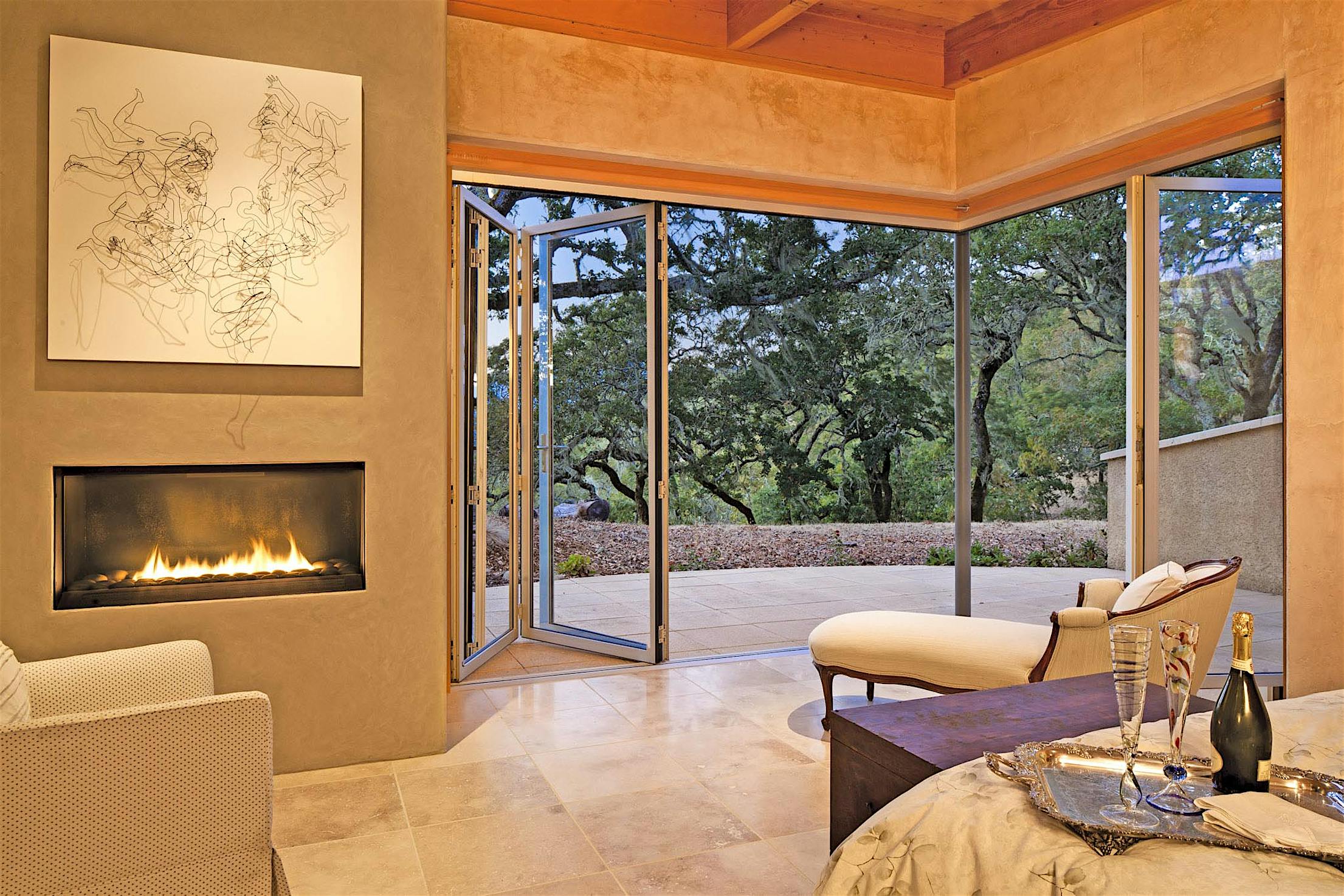 bedroom with open corner design with folding doors