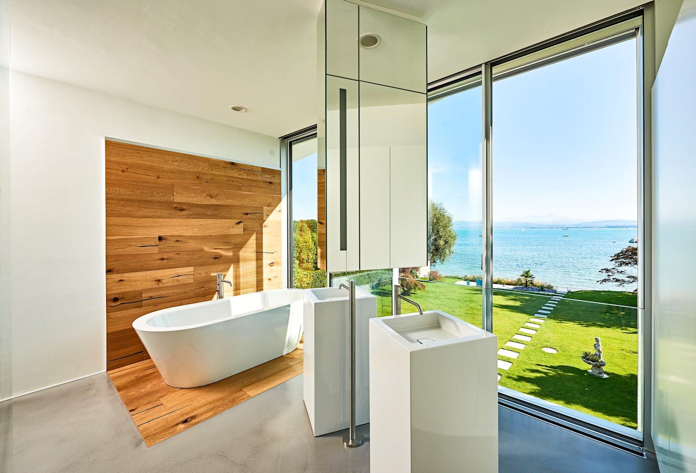 exterior moving glass walls create bathrooms with a view