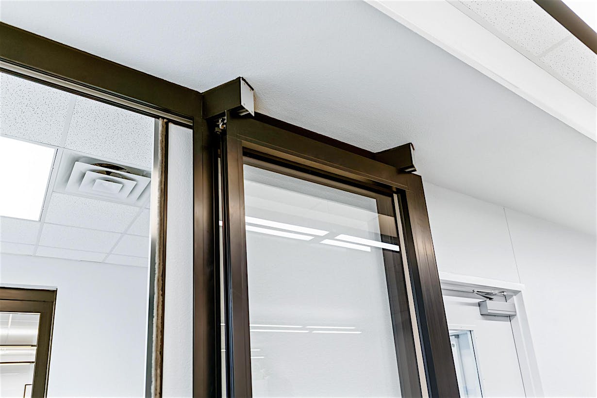 NanaWall HSW stacking glass doors park remotely in learning hub design