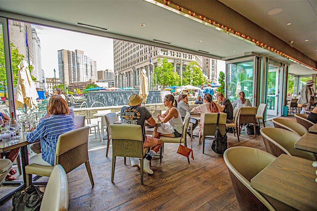 indoor outdoor restaurant with exterior stacking glass doors