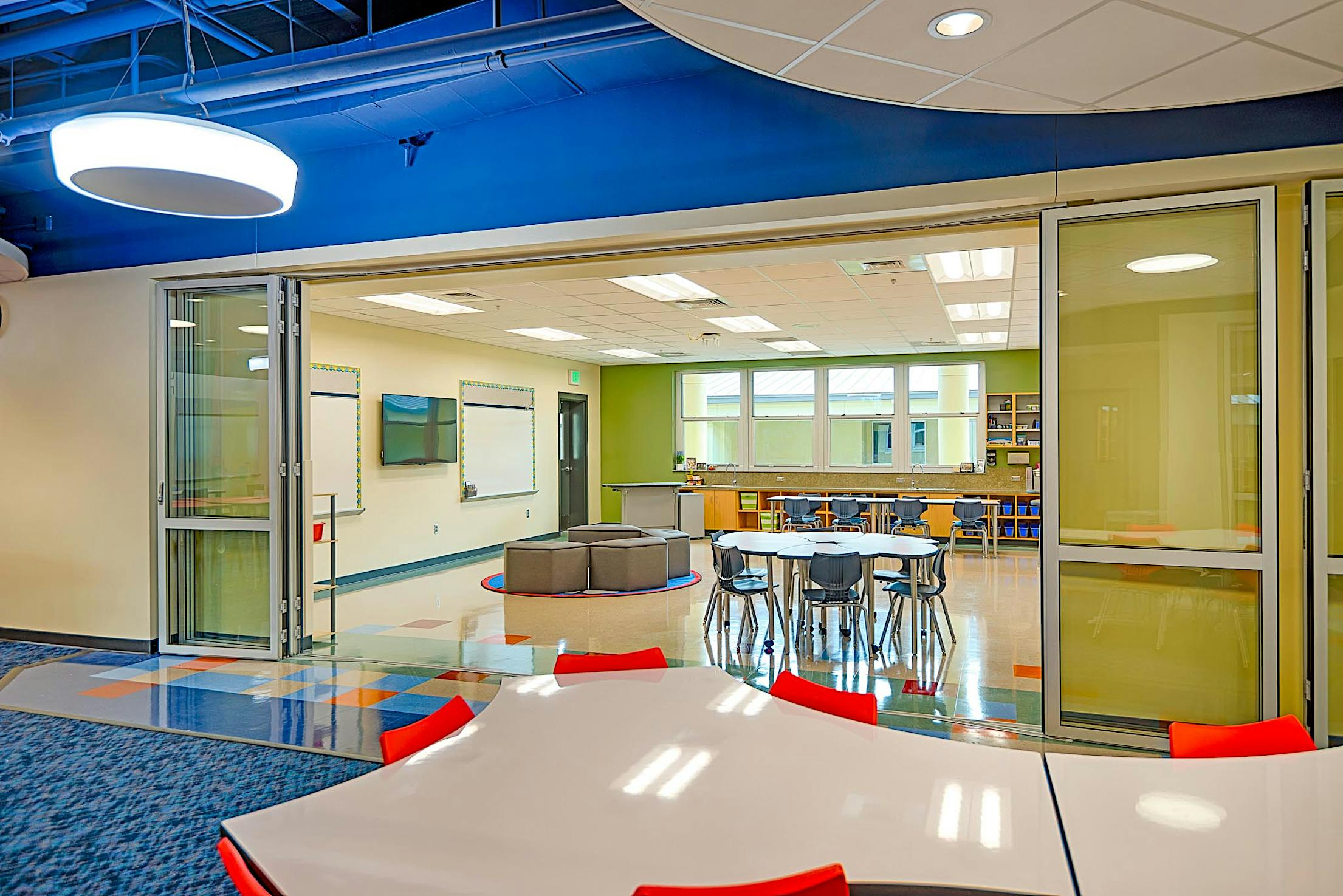 interior folding glass walls in commercial application with FoldFlat
