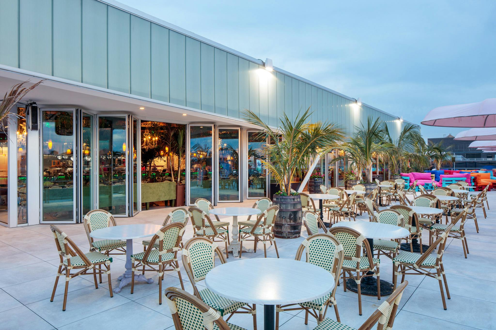 Rooftop Dining with Commercial Folding Glass Doors NanaWall