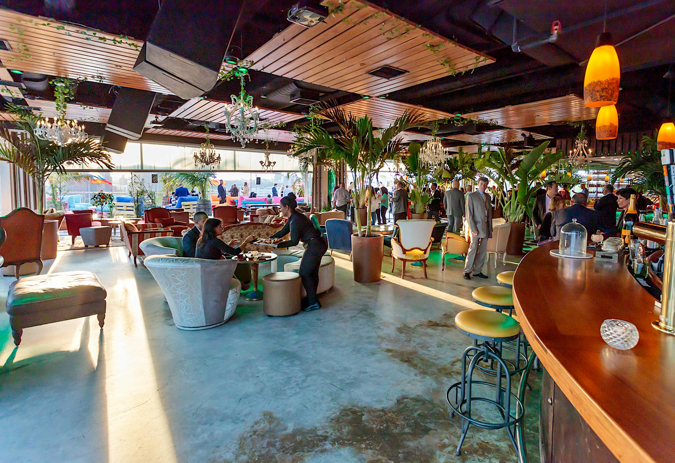 rooftop bar with collapsible glass walls