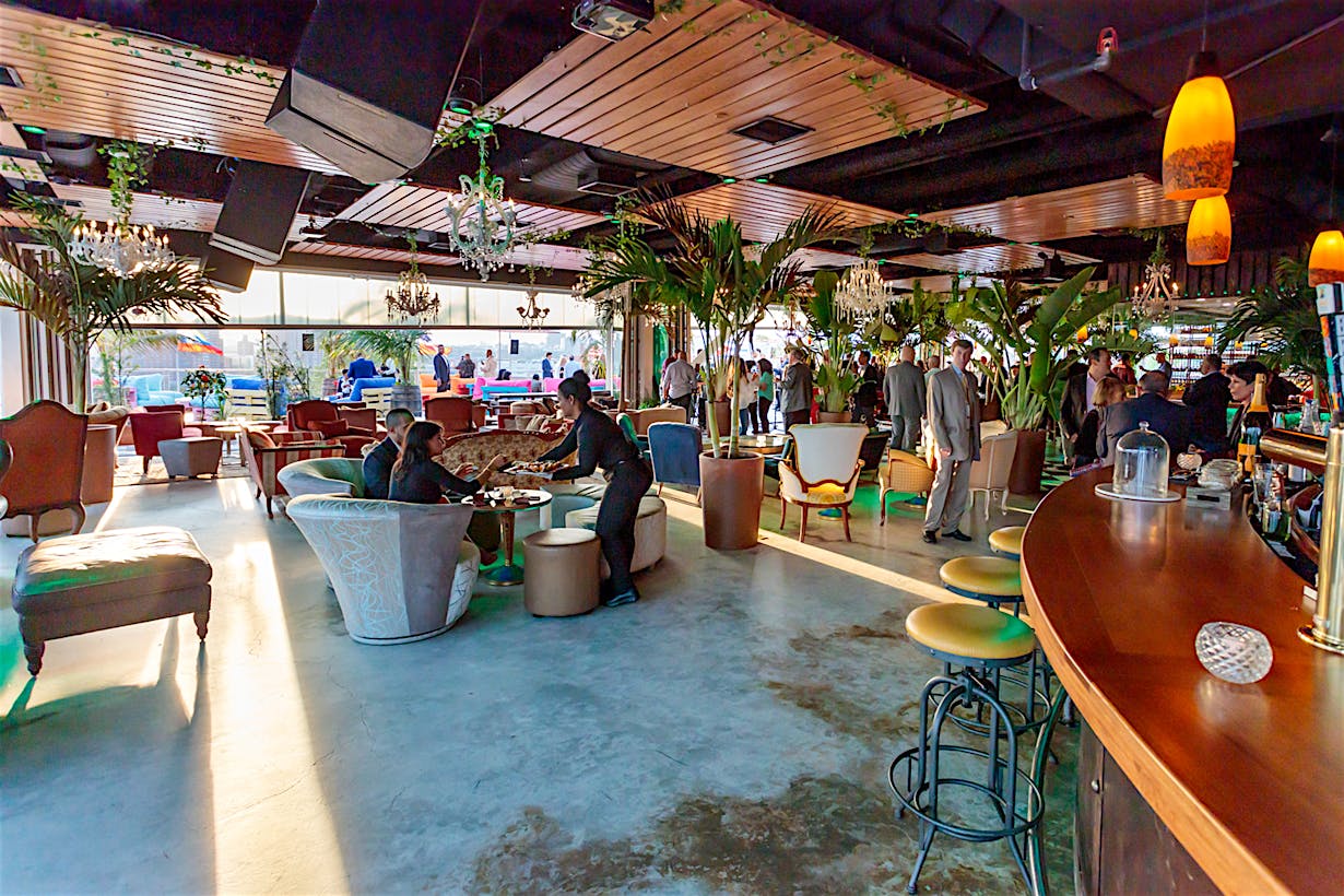 rooftop bar with collapsible glass walls