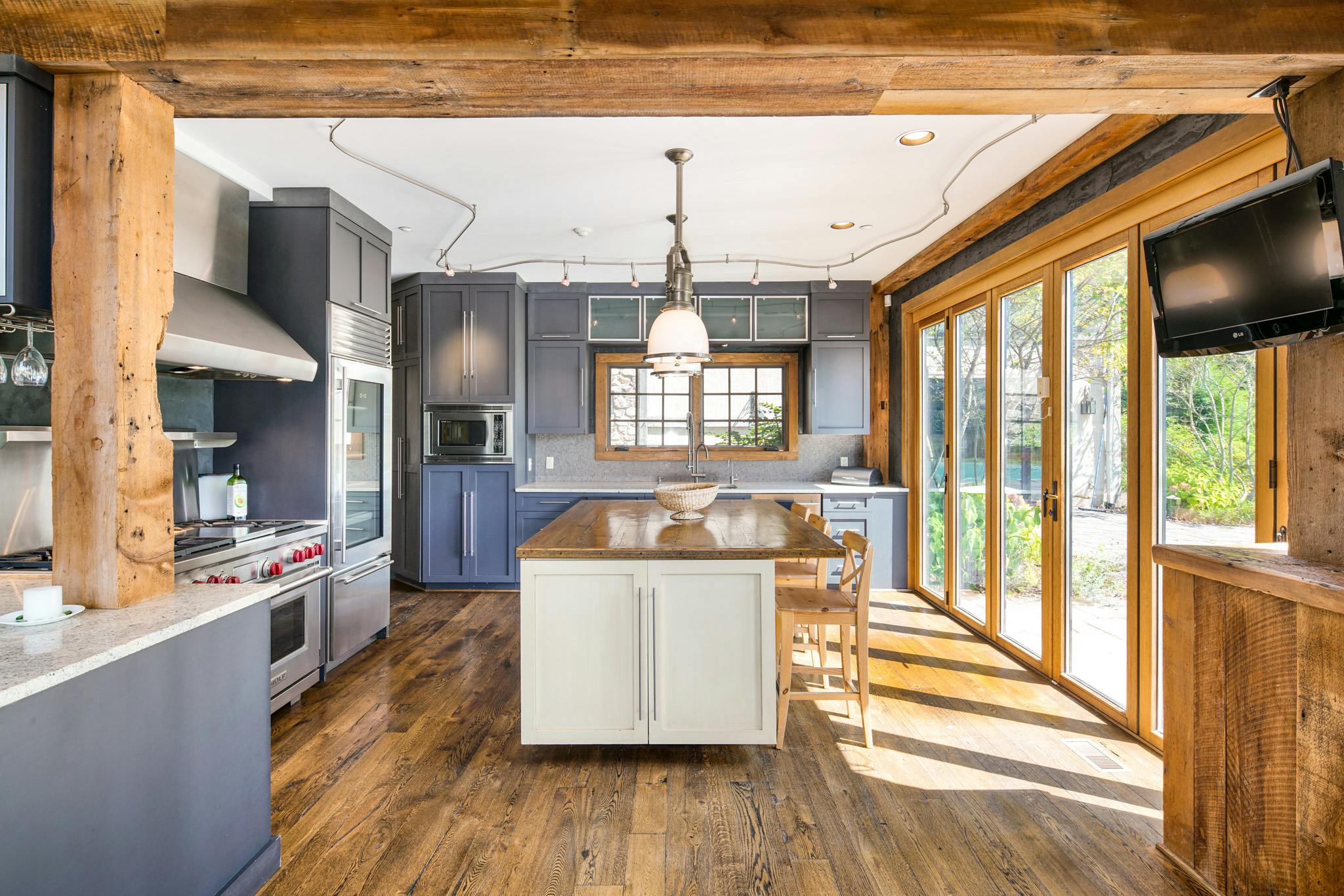 kitchen with accordion glass doors