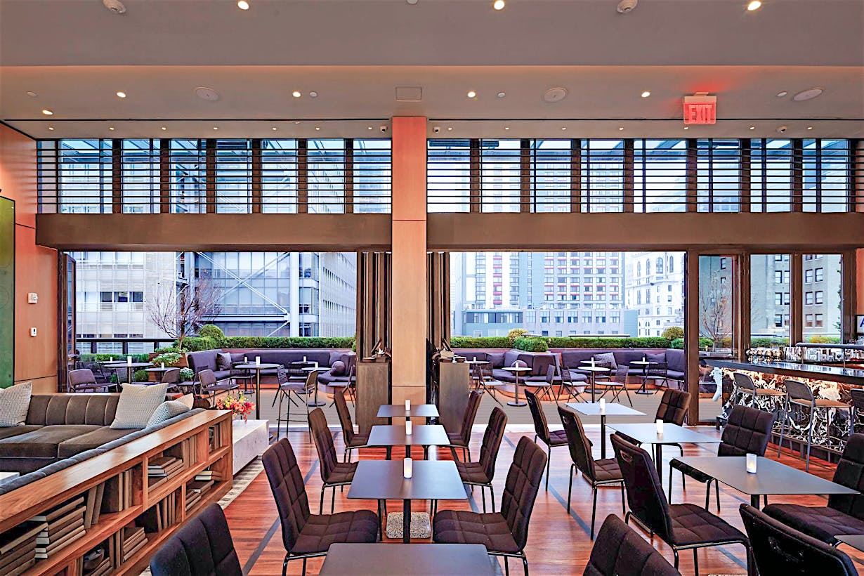 post-covid design for hotels on rooftop with commercial glass walls