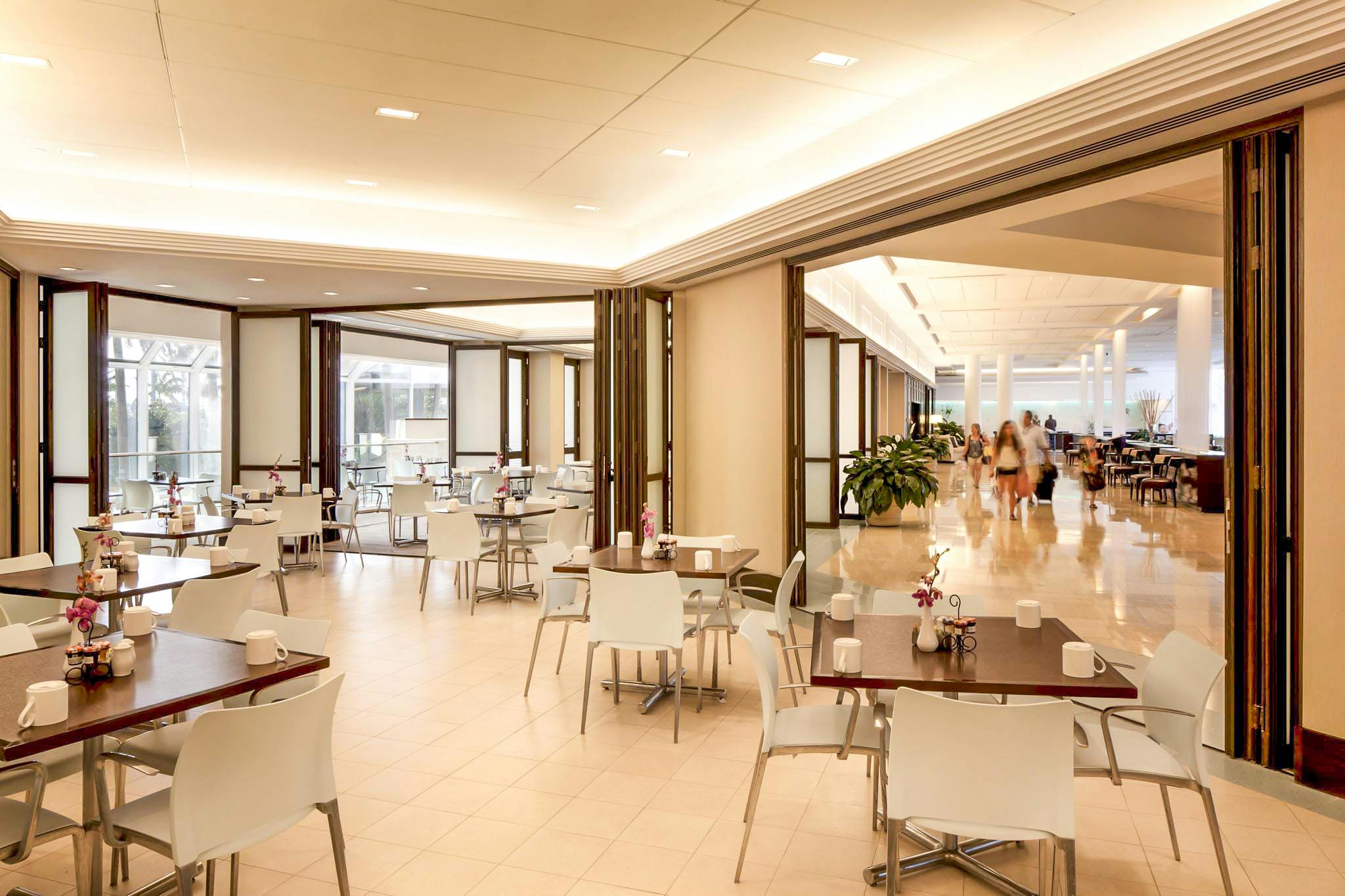 interior commercial glass walls in hotel breakfast area