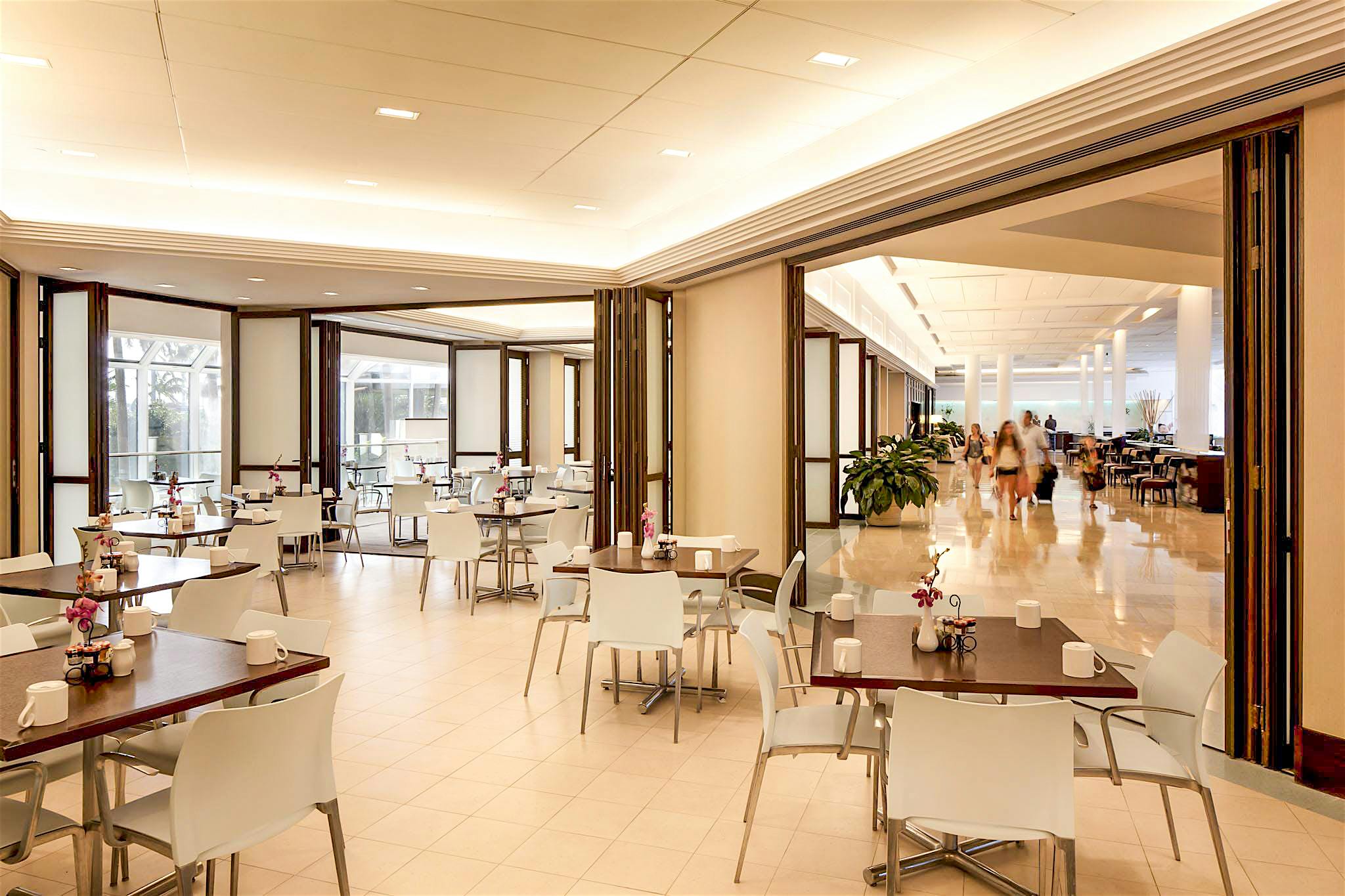 interior commercial glass walls in hotel breakfast area