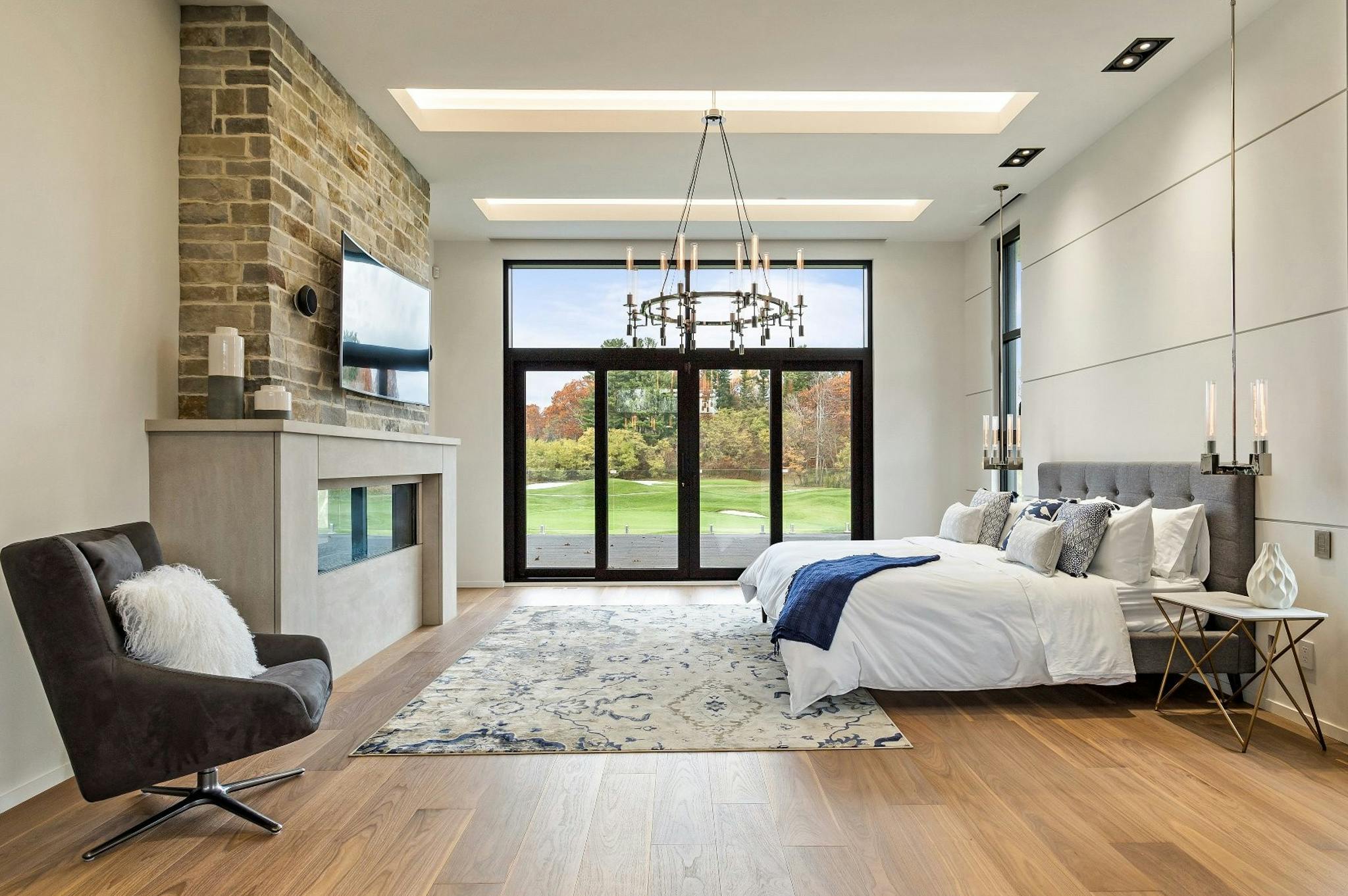 exterior glass wall systems in a bedroom 