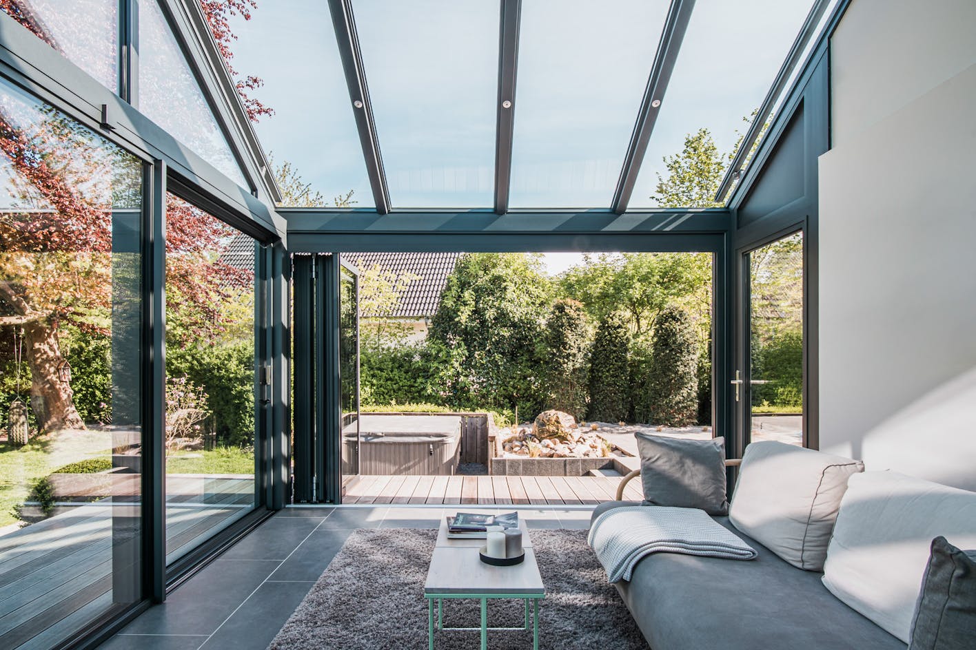 opening glass patio doors in a sunroom