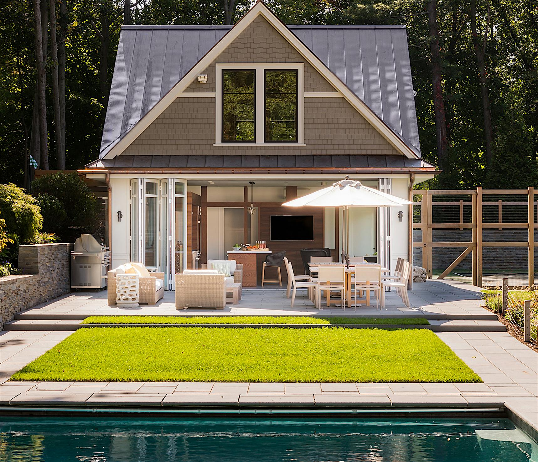 pool house with NanaWall operable glass walls
