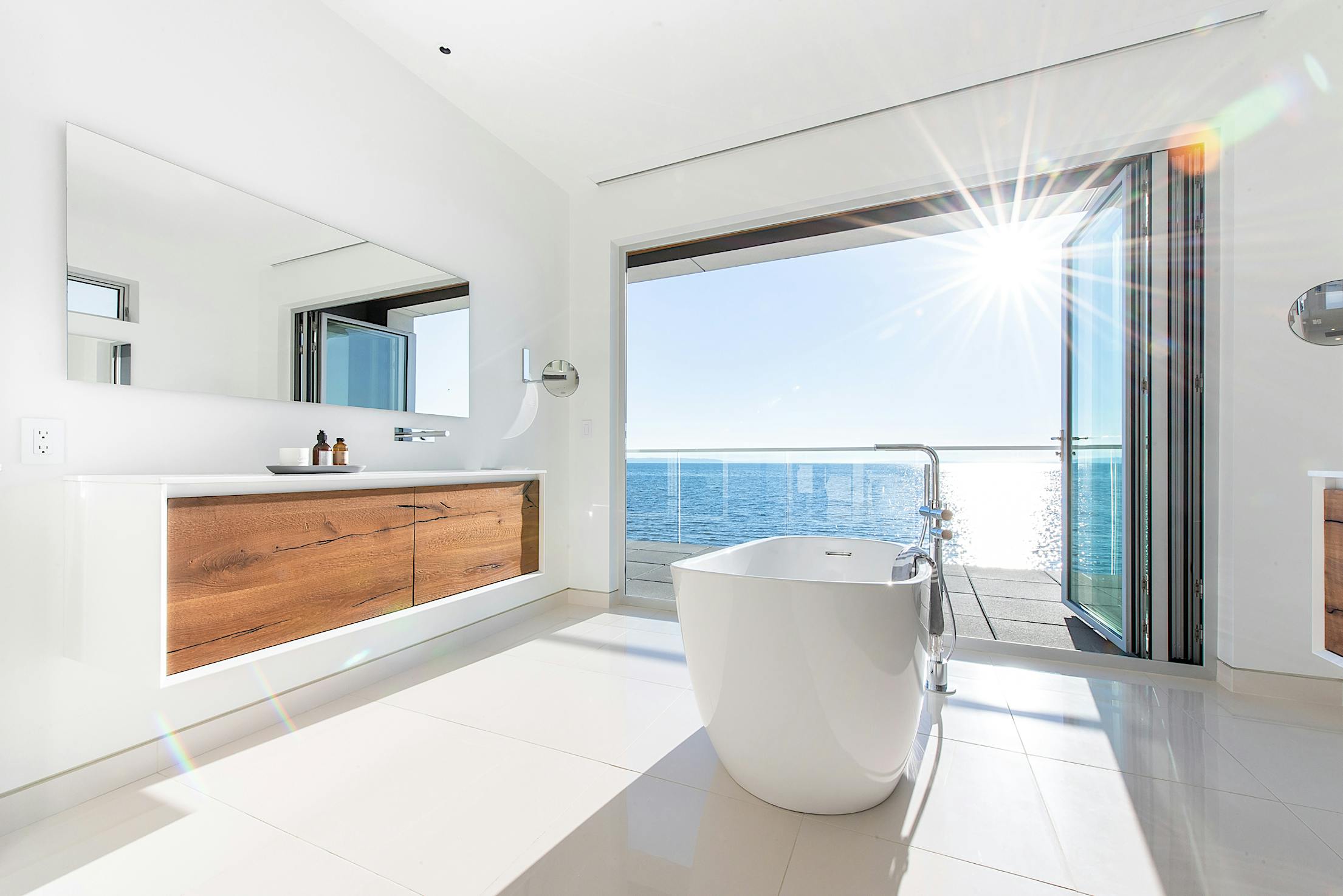 folding glass wall systems in bathroom design
