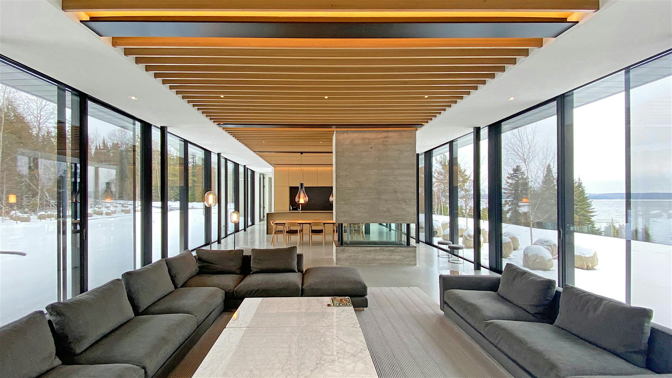 aluminum moveable glass walls in modern home