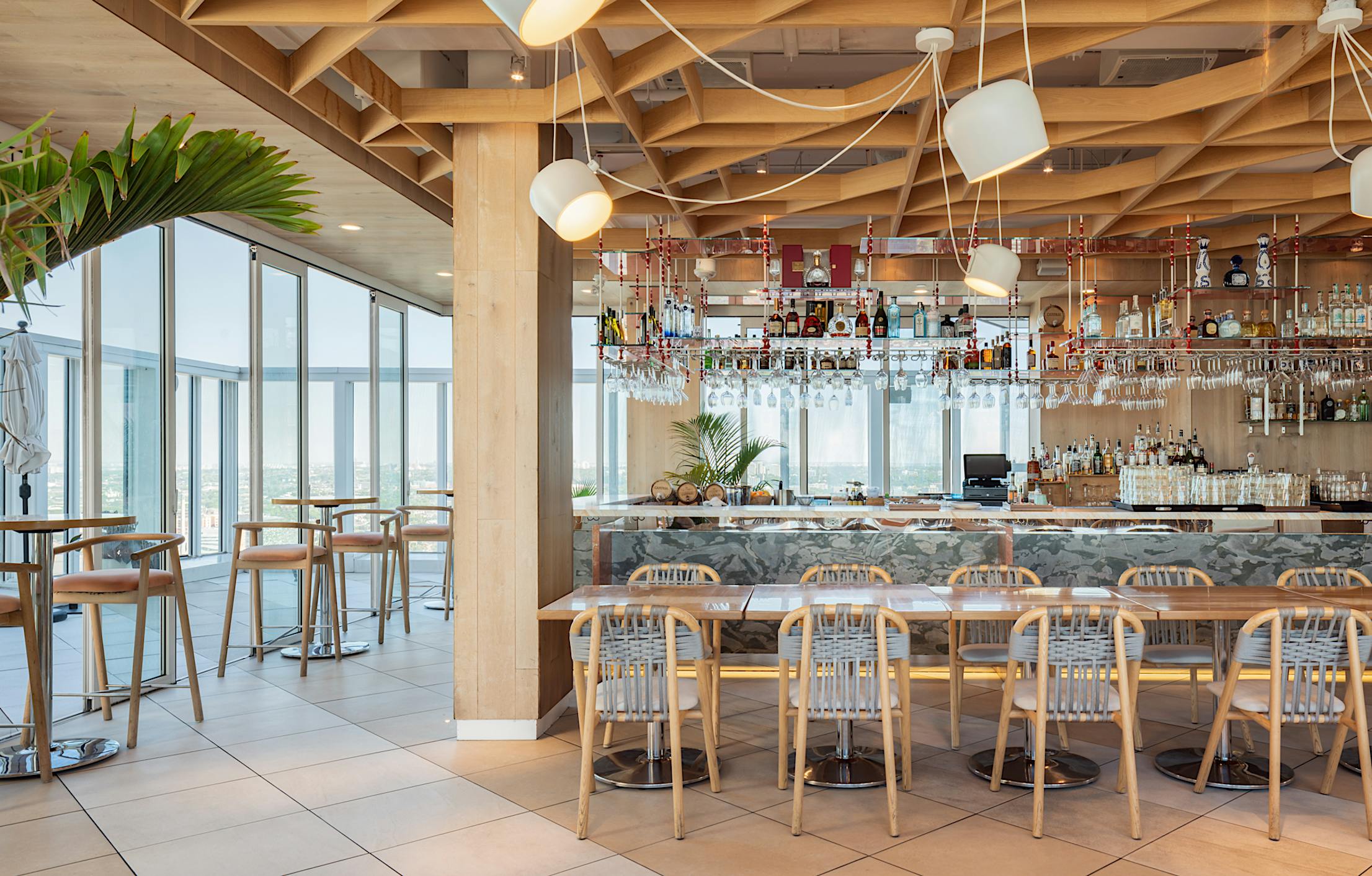best rooftop bars with commercial glass walls